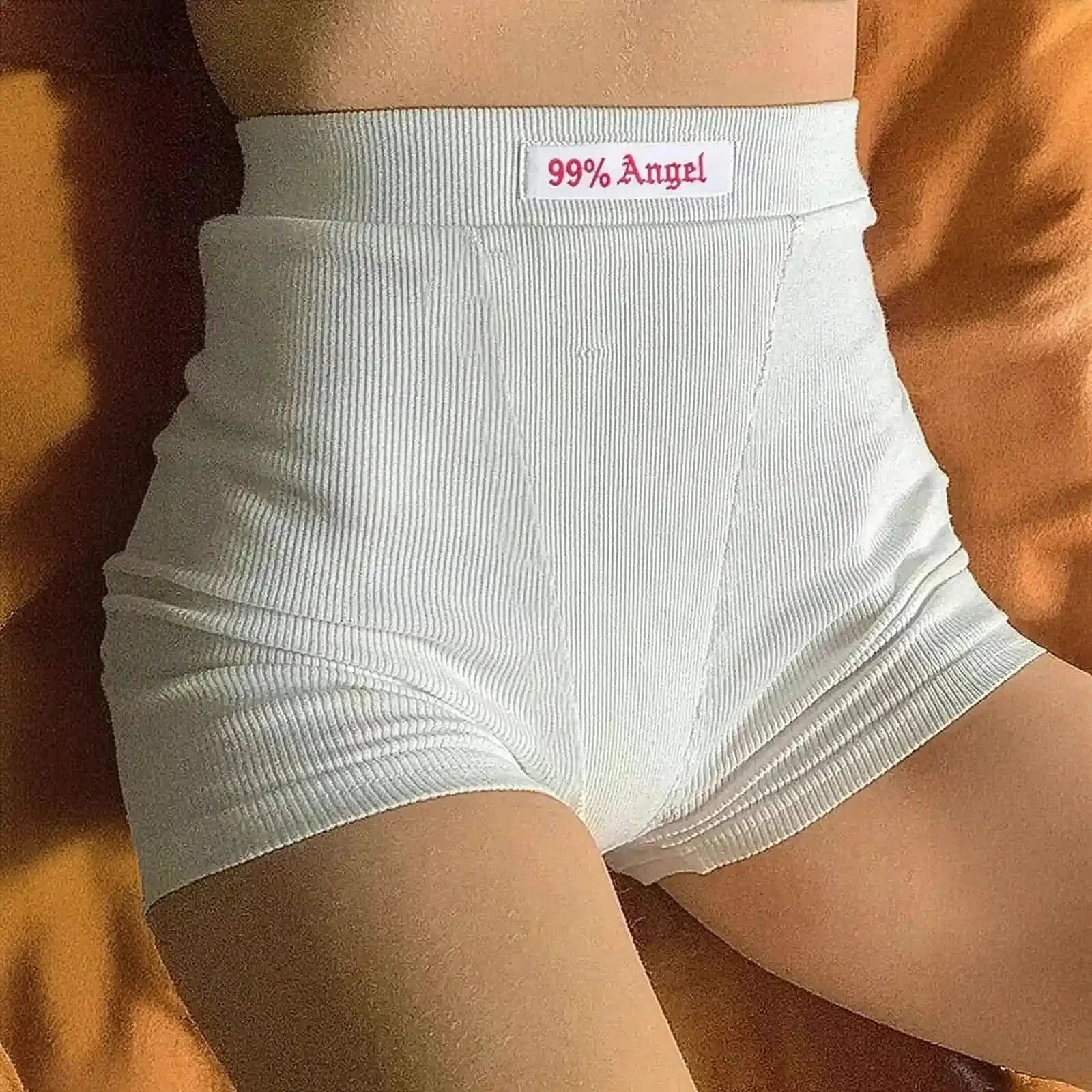 Maille côtelée noire à broderie blanche stylée - Saylana