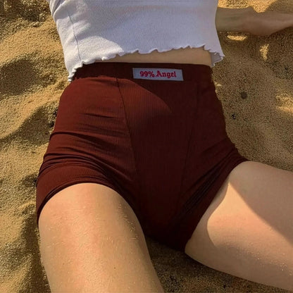 Maille côtelée noire à broderie blanche stylée - Saylana